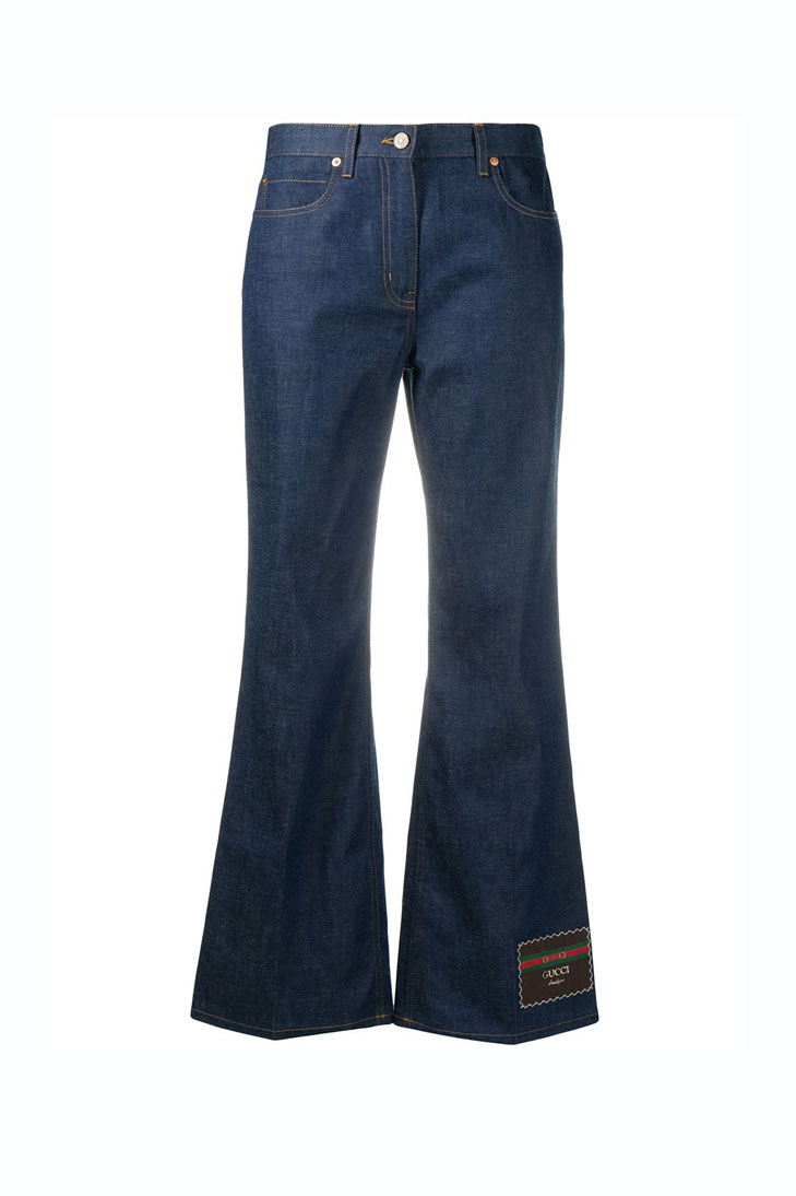 Расклешенные джинсы GUCCI с нашивкой-логотипом