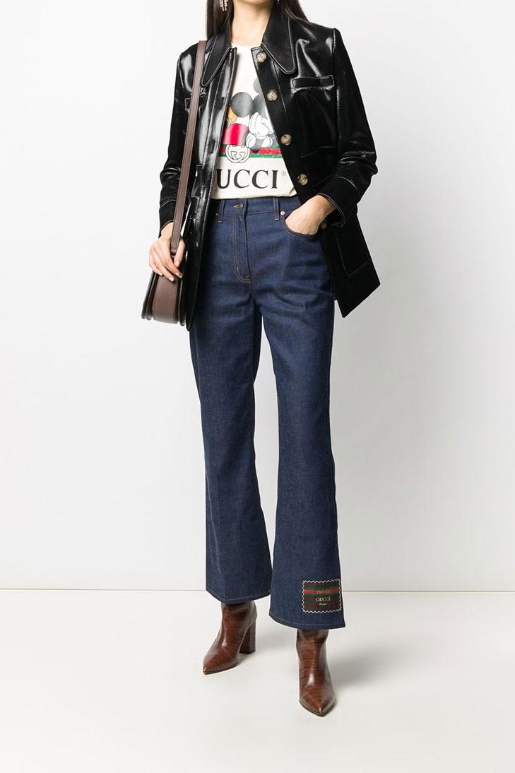 Расклешенные джинсы GUCCI с нашивкой-логотипом
